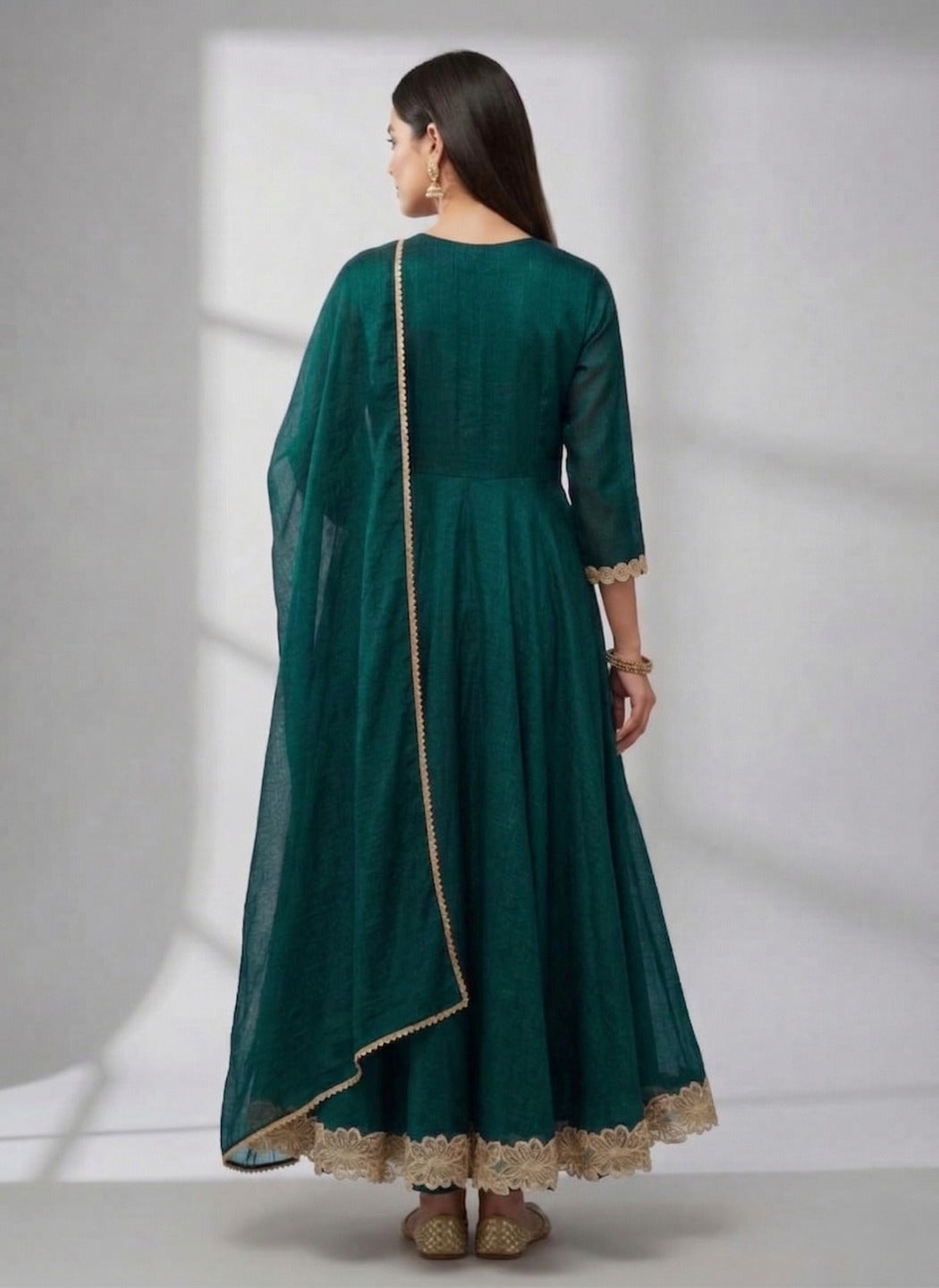 Three images of a women's green Anarkali dress with matching pants and dupatta from Crazy Needle Online.