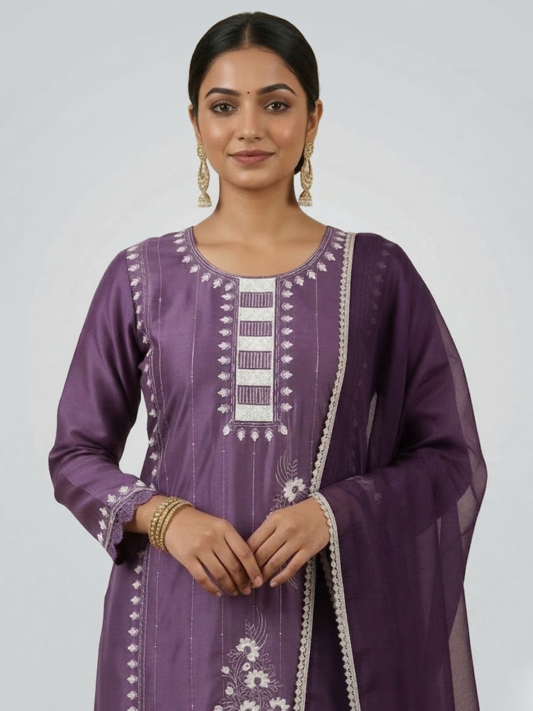 Women's purple handwork kurti pant set with dupatta, featuring intricate embroidery and traditional style, shown in three images.
