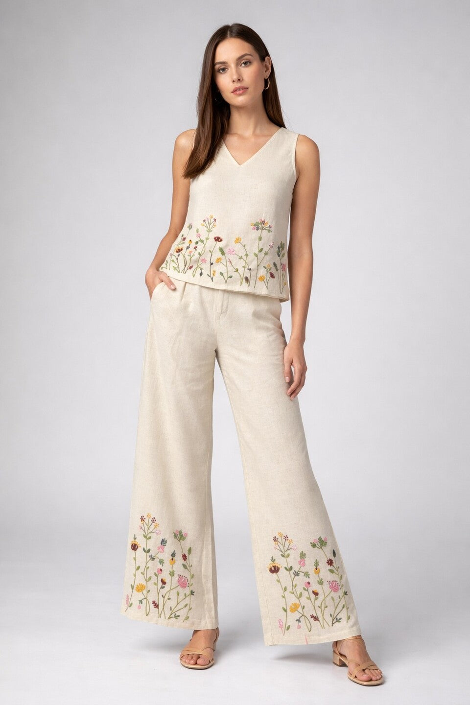 Women’s cream embroidered co-ord set featuring a sleeveless top and wide-leg pants, displayed on a white background.