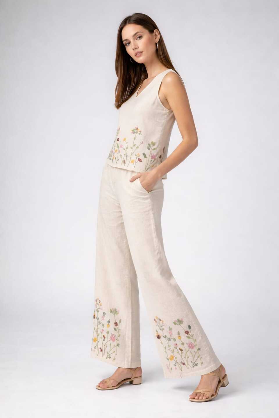 Women’s white embroidered co-ord set featuring a sleeveless top and wide-leg pants by Crazy Needle Online.