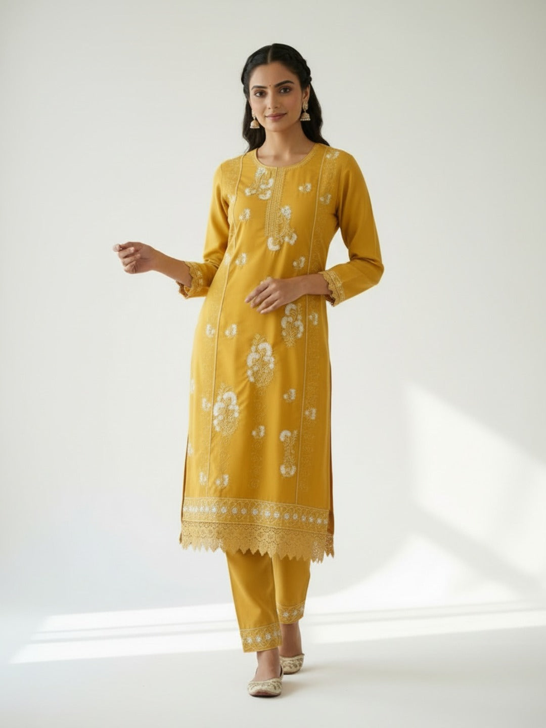 Women's yellow thread work kurti pant set with dupatta, traditional Indian attire, featuring intricate embroidery and vibrant fabric.