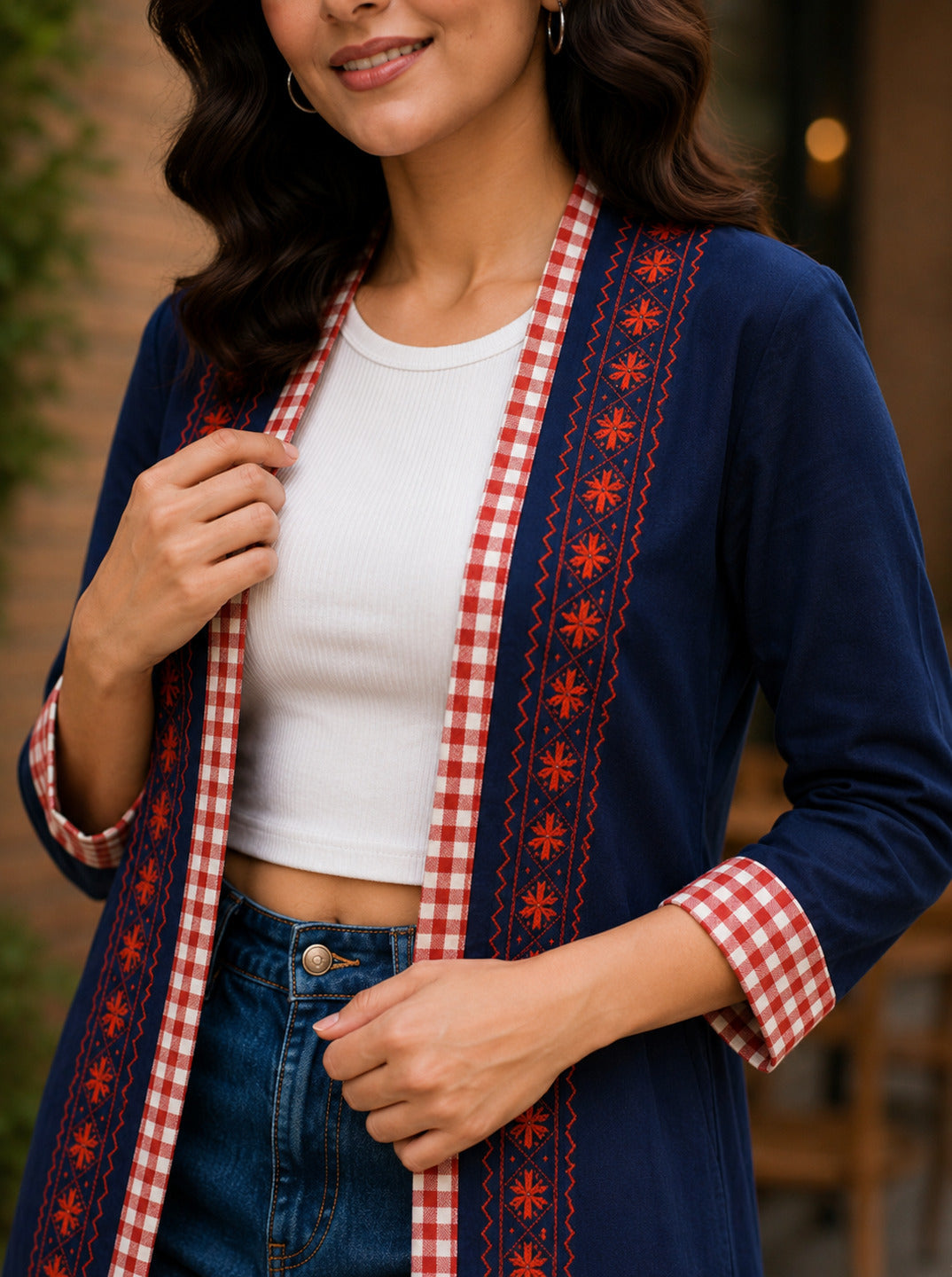 Women's navy cotton shrug from Crazy Needle Online, featuring long sleeves and a relaxed fit, perfect for casual wear.